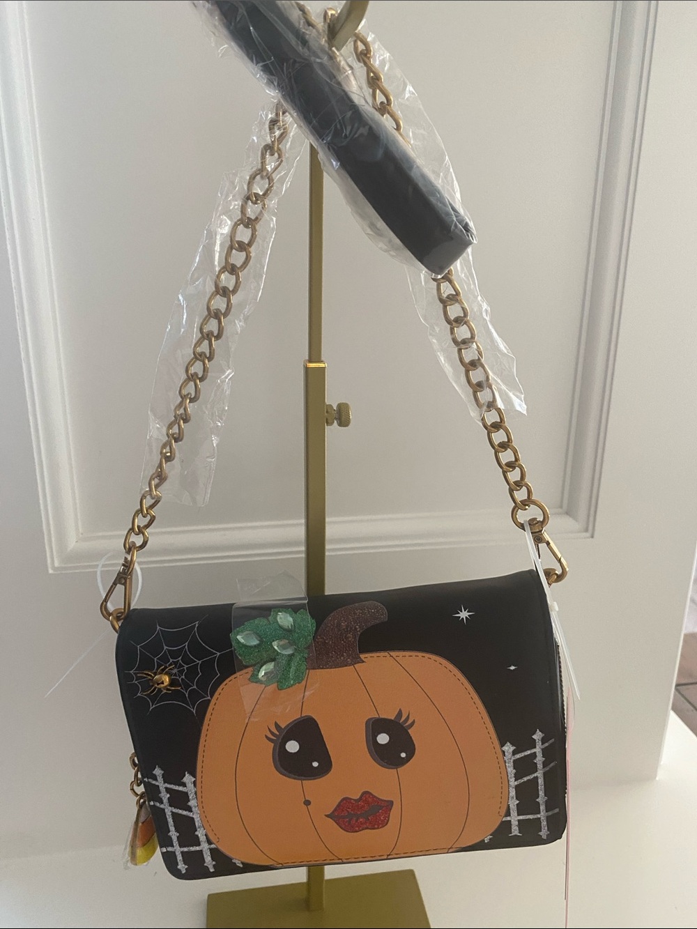 Betsey Johnson Black Crossbody Bag with Orange Pumpkin Motif and Gold Chain